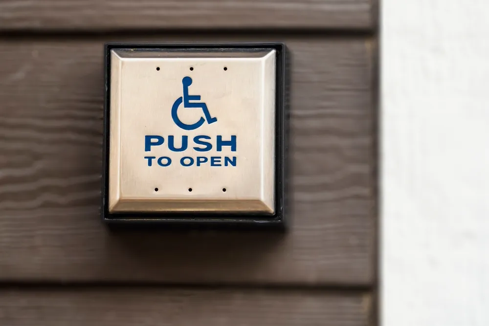 Close,Up,View,Of,Button,To,Open,Wheelchair,Accessible,Door