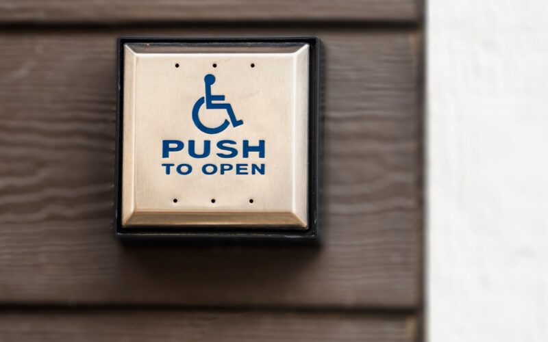 Close,Up,View,Of,Button,To,Open,Wheelchair,Accessible,Door