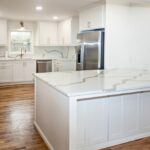 Light,And,Bright,Newly,Remodeled,White,Kitchen,With,Quartz,Countertops,